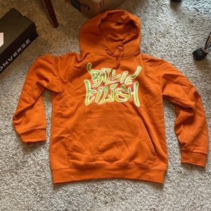 Orange Billie Eilish sweatshirt